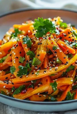 Colorful Asian carrot salad with fresh vegetables and dressing