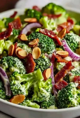 Fresh and colorful broccoli salad with nuts and dressing