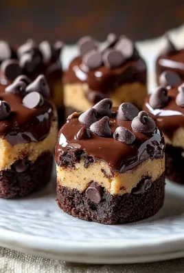 Delicious chocolate chip cookie dough brownie bites on a plate