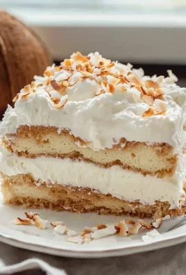 Delicious Coconut Tiramisu dessert topped with coconut flakes