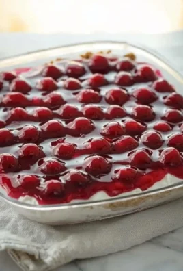 Delicious no-bake cherry cheesecake topped with fresh cherries and creamy filling