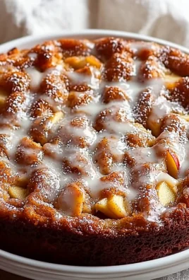 Delicious homemade apple fritter cake with glaze and apple chunks