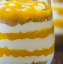 Layered mango cheesecake parfaits made with 5 ingredients