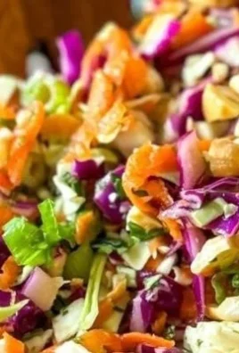 Delicious Asian Crunch Salad with colorful veggies and crunchy toppings