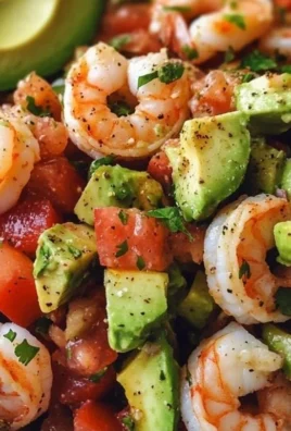 Avocado Salsa Shrimp Salad served in a bowl with fresh ingredients and colorful toppings.
