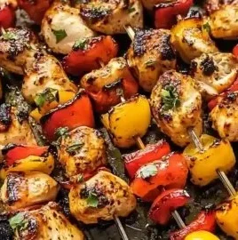 Delicious Chicken Kabobs baking in the oven for a flavorful meal.
