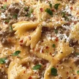 Creamy Parmesan Garlic Beef Bowtie Pasta served in a bowl
