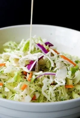 Disneyland coleslaw recipe served in a bowl with fresh ingredients