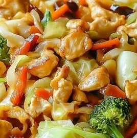 Delicious cabbage stir fry with chicken served in a vibrant bowl.