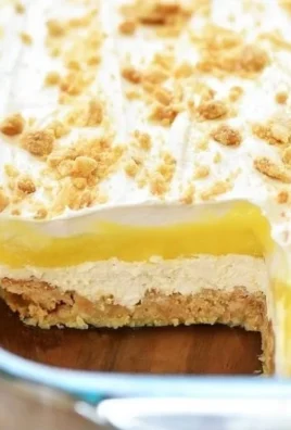 Heavenly Oreo Lemon Dessert with creamy lemon filling and Oreo crust