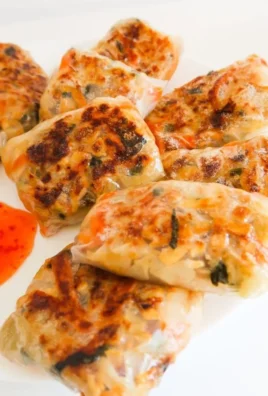 Plate of high-fiber high-protein recipes with colorful vegetables and grains.