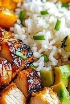 Delicious Hot Honey Chicken Bowls with colorful vegetables and drizzled honey