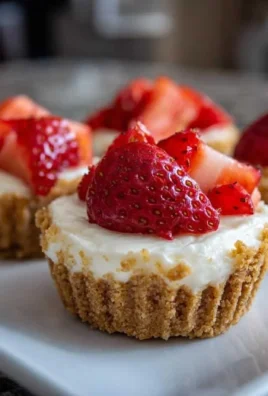 Delicious no-bake mini cheesecake cups topped with fruit and ready in 15 minutes