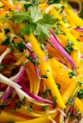 Colorful Mango Slaw with fresh ingredients in a bowl