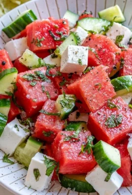 Delicious Watermelon Cucumber Feta Salad served in a bowl with fresh ingredients.