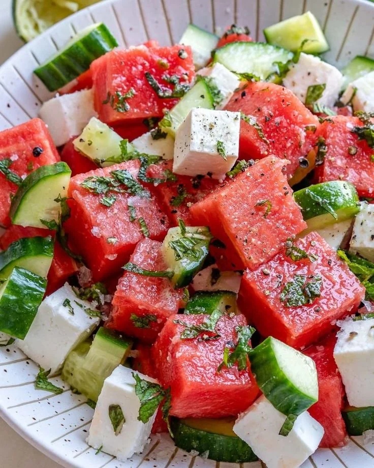 Delicious Watermelon Cucumber Feta Salad served in a bowl with fresh ingredients.