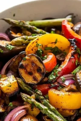 Colorful grilled veggies marinated and ready to serve on a plate