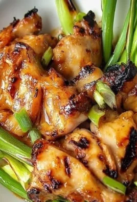 Delicious Vietnamese grilled chicken garnished with herbs and spices