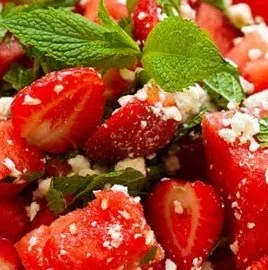 Delicious Watermelon Salad with feta cheese and mint on a serving plate