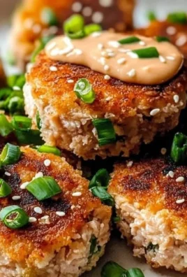 Asian Tuna Cakes with Spicy Mayo served on a plate