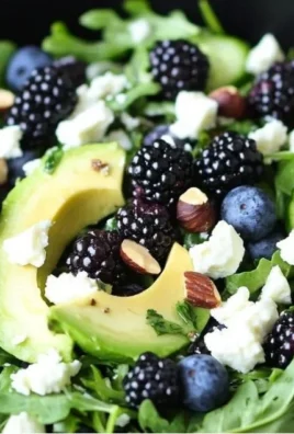 Delicious Blackberry Avocado Salad garnished with fresh blackberries and avocado slices.