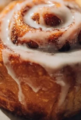 Delicious cinnamon roll glaze bombs with a creamy glaze on top