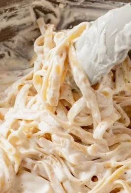 Delicious Cottage Cheese Alfredo sauce over pasta, a healthier twist on classic Alfredo.