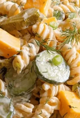 Delicious Dill Pickle Pasta Salad served in a bowl