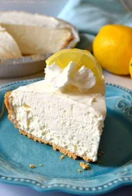 Delicious frozen lemonade pie garnished with lemon slices
