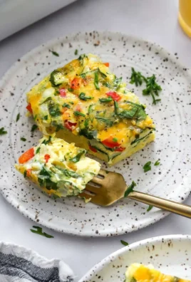 High-protein cottage cheese egg bake topped with fresh herbs