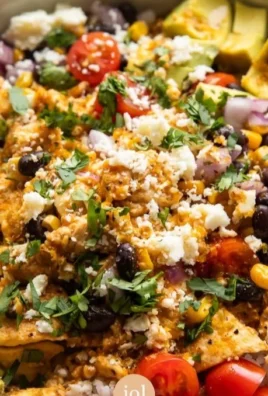 Hot Honey Baja Chicken Bowl with grilled chicken, fresh veggies, and spicy sauce