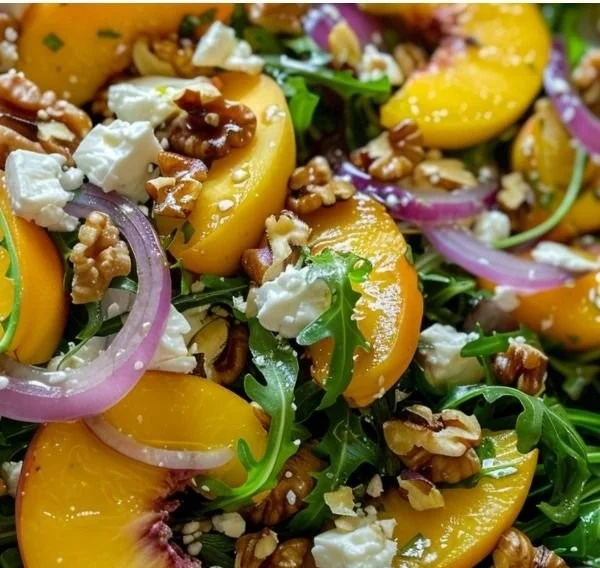 Fresh Peach Arugula Salad with vibrant ingredients and a tangy dressing