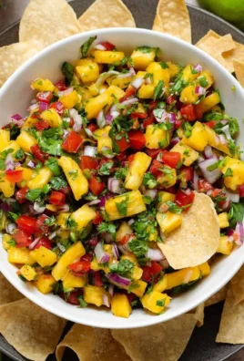 Fresh Pineapple Pico de Gallo served in a bowl with colorful ingredients.