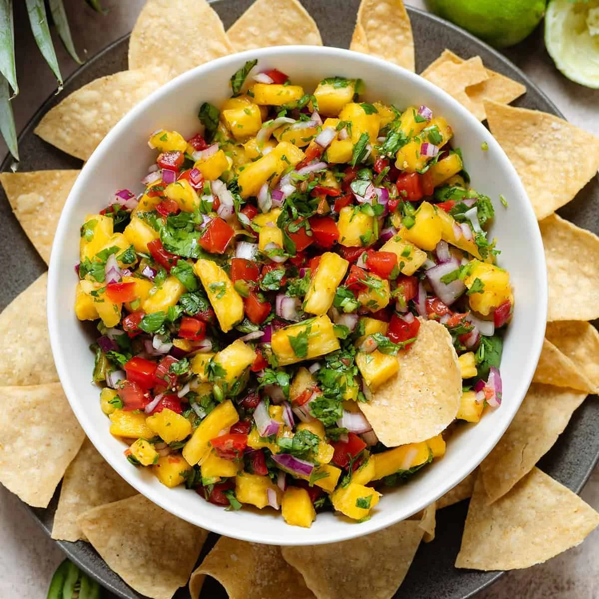 Fresh Pineapple Pico de Gallo served in a bowl with colorful ingredients.