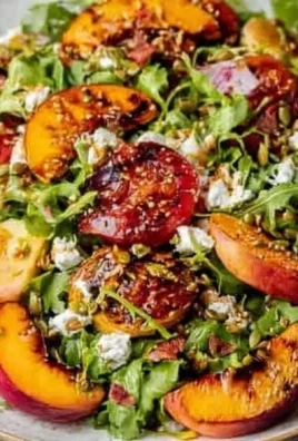 Summer grilled peach salad with fresh greens and vibrant ingredients