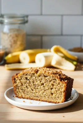 Delicious slice of healthy banana bread on a wooden cutting board