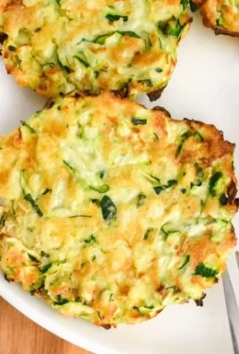 Crispy air fryer zucchini fritters served with dipping sauce