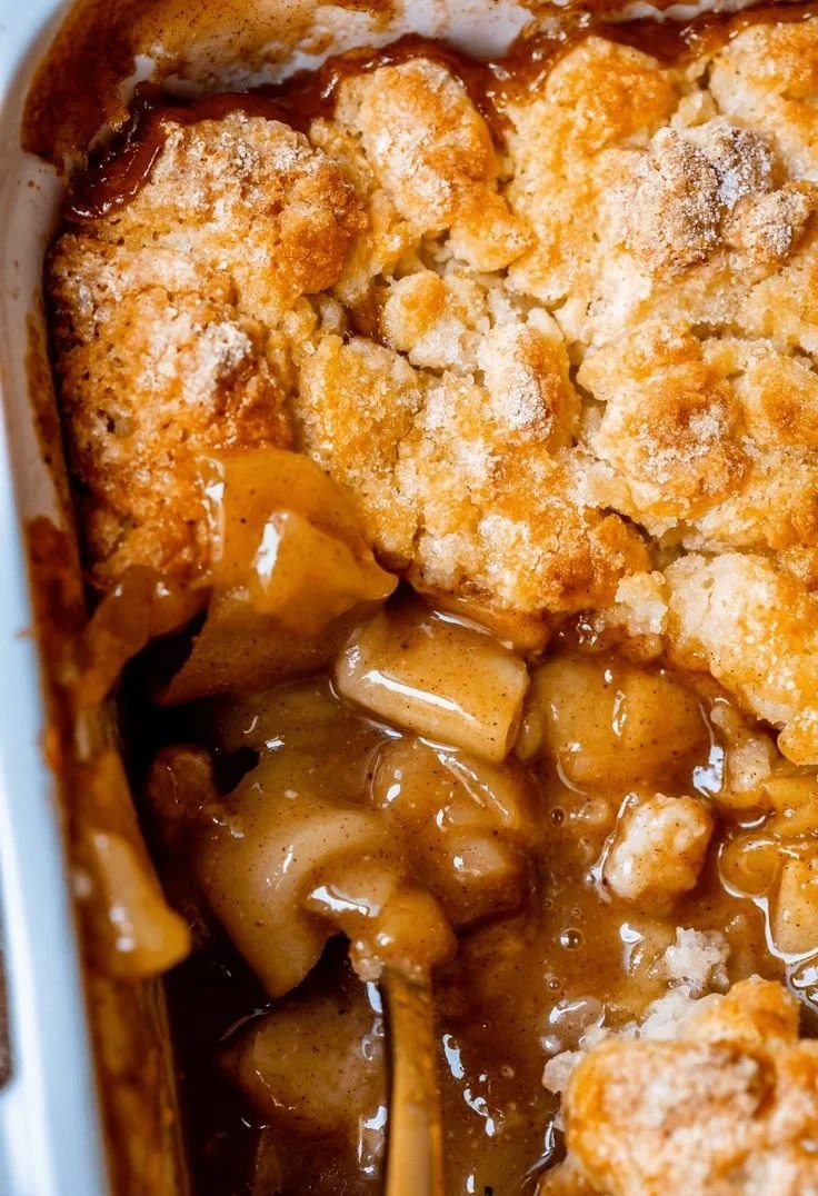 Delicious homemade apple cobbler served warm with a scoop of ice cream