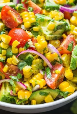 Delicious and colorful Avocado Corn Salad featuring fresh ingredients.
