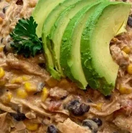 Delicious Crock Pot Fiesta Chicken with colorful ingredients ready to serve.