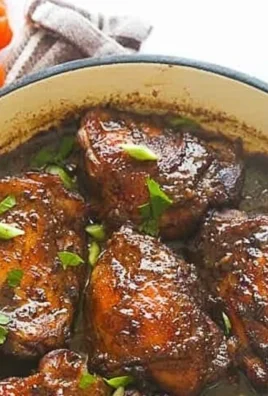Crockpot jerk chicken with spices and herbs in a serving dish