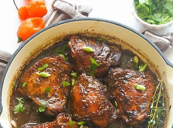 Crockpot jerk chicken with spices and herbs in a serving dish