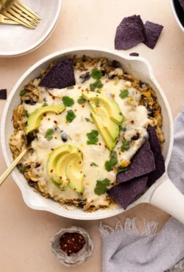 Salsa Verde Chicken and Rice Skillet in a colorful presentation with fresh ingredients.