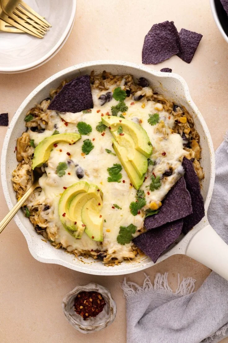 Salsa Verde Chicken and Rice Skillet in a colorful presentation with fresh ingredients.