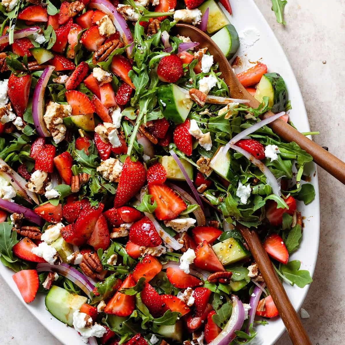 Fresh Strawberry Goat Cheese Salad with greens and dressing